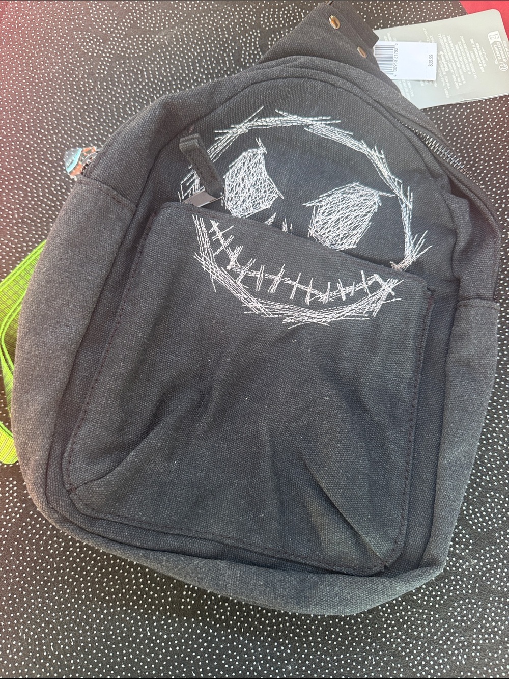 Black Canvas Men’s Backpack with White Sketch Face Design